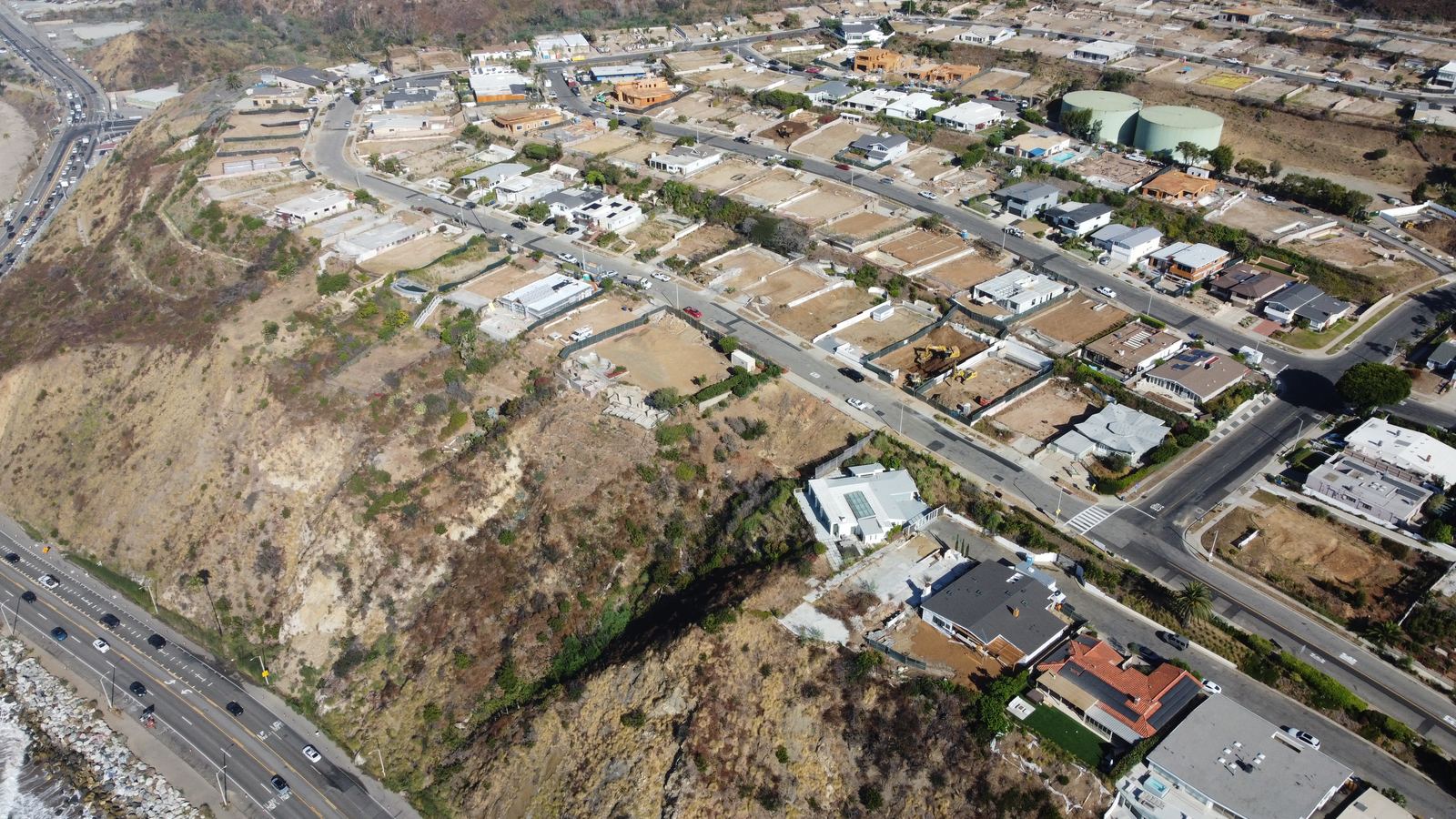 Aerial view of a coastal residential street, showing lot lines, setbacks and neighbouring construction